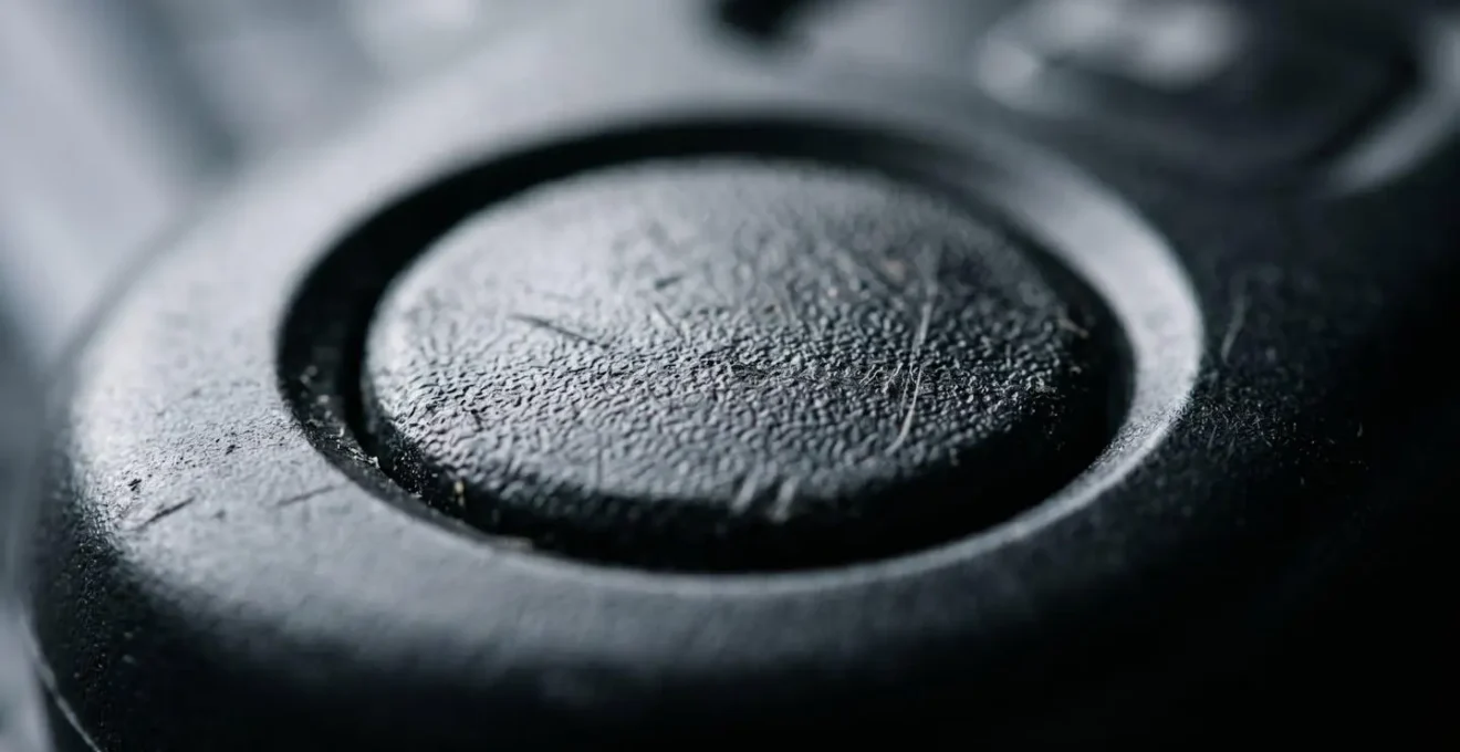 Extreme close-up macro photograph showing textural detail of automotive key fob security technology