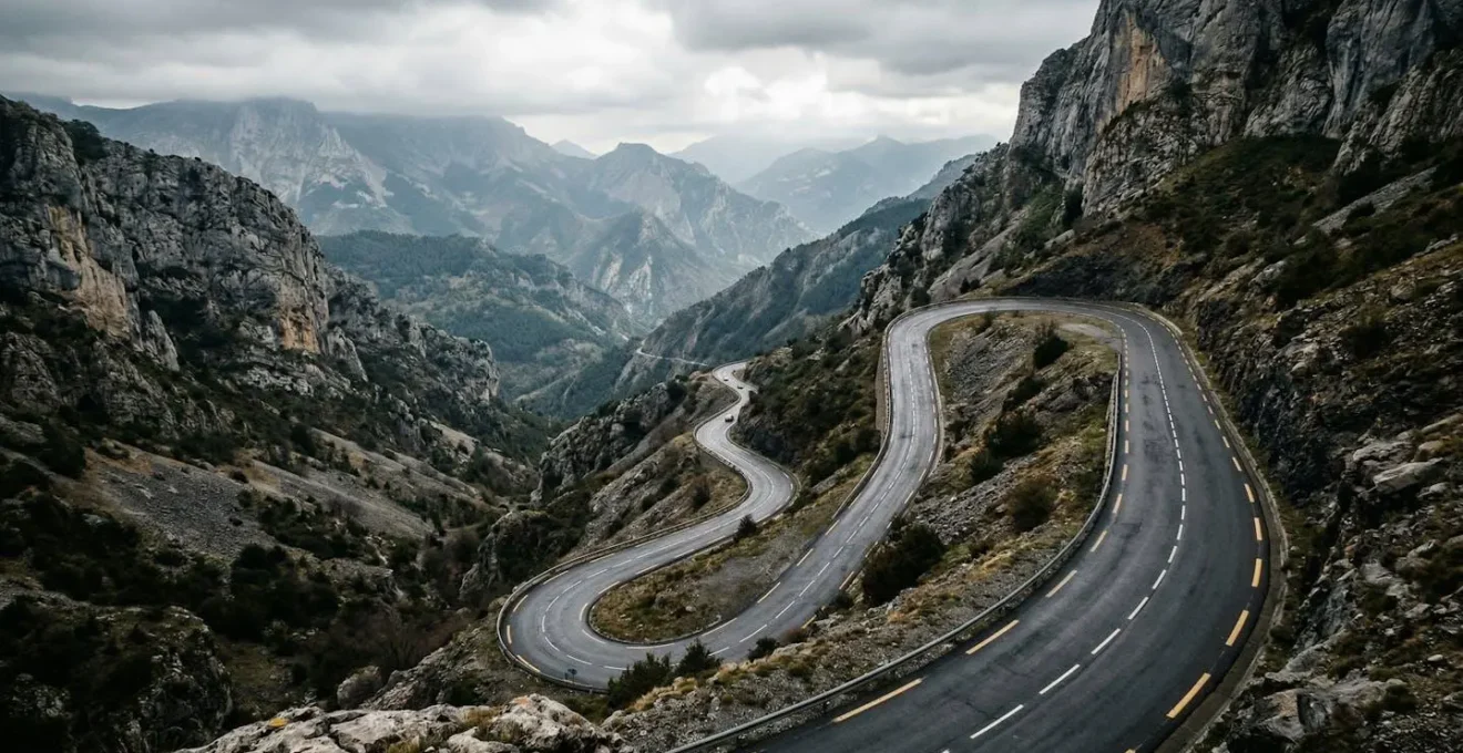 Modern vehicle camera system monitoring lane markings on challenging narrow mountain road