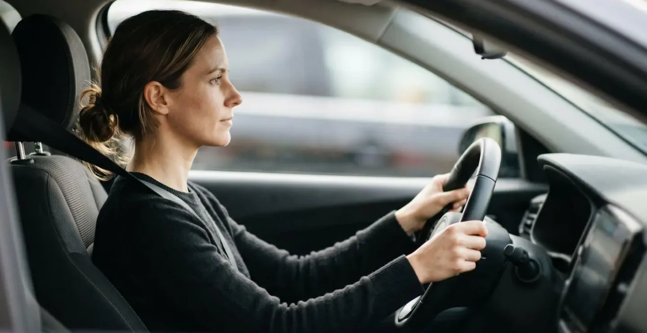 Side view demonstrating correct driver posture and distance from steering wheel for optimal airbag protection Side view demonstrating correct driver posture and distance from steering wheel for optimal airbag protection